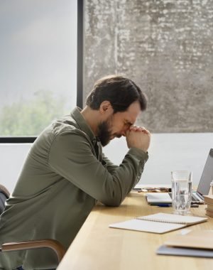 medium-shot-man-dealing-with-imposter-syndrome